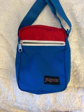 JanSport Weekender Square Sling Bag Blue Red and White
